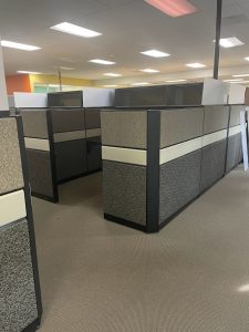 Teknion Tos cubicles, available in multiple sizes, combined height as 64 and 52 includes panels with widths of 24,36, and 48 acoustic tiles covered with neutral colored fabric, spine electricity, 30x84 and 24x66 work surfaces 36 "and 48" storage cabinet task light and pedestal